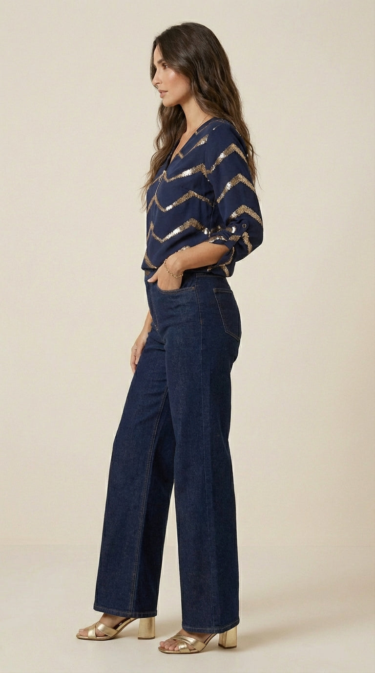 Blusa con cremallera semicerrada y acabado artesanal