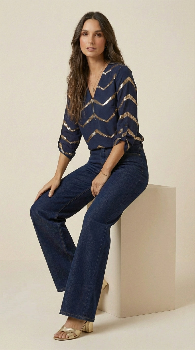 Blusa con cremallera semicerrada y acabado artesanal