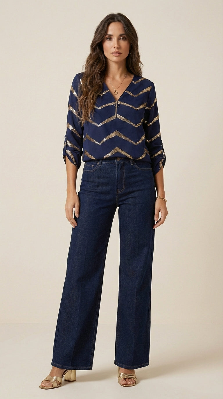 Blusa con cremallera semicerrada y acabado artesanal
