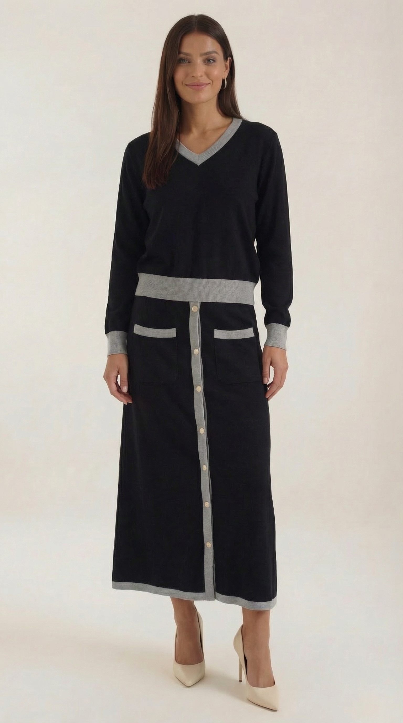 Conjunto de suéter con escote en V y falda midi fluida