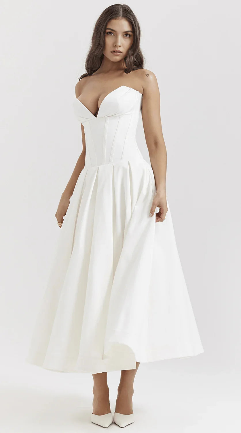 Vestido maxi fluido con detalles artesanales