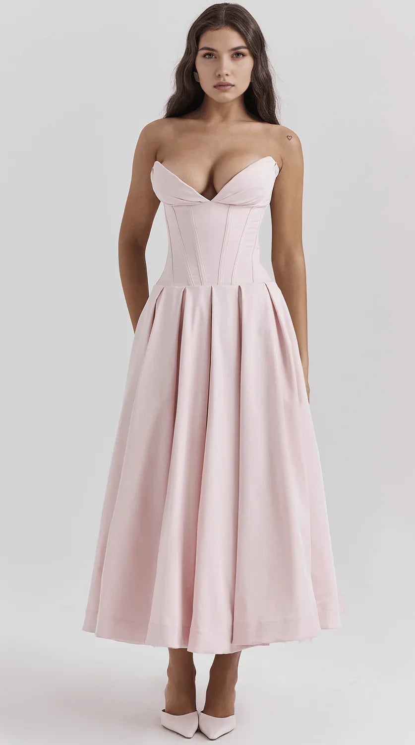 Vestido maxi fluido con detalles artesanales