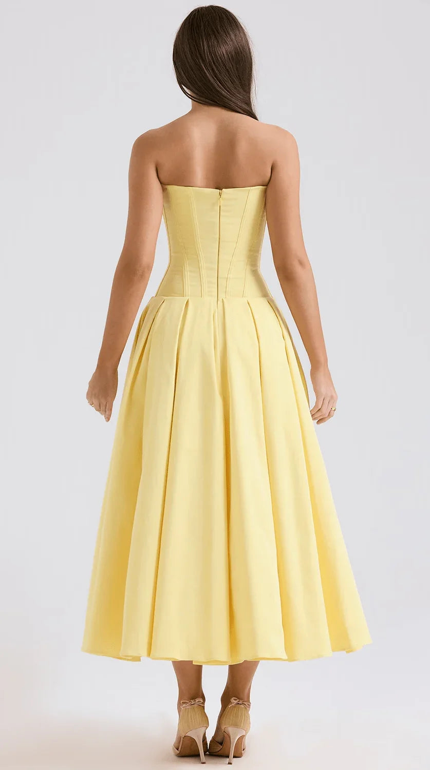 Vestido maxi fluido con detalles artesanales