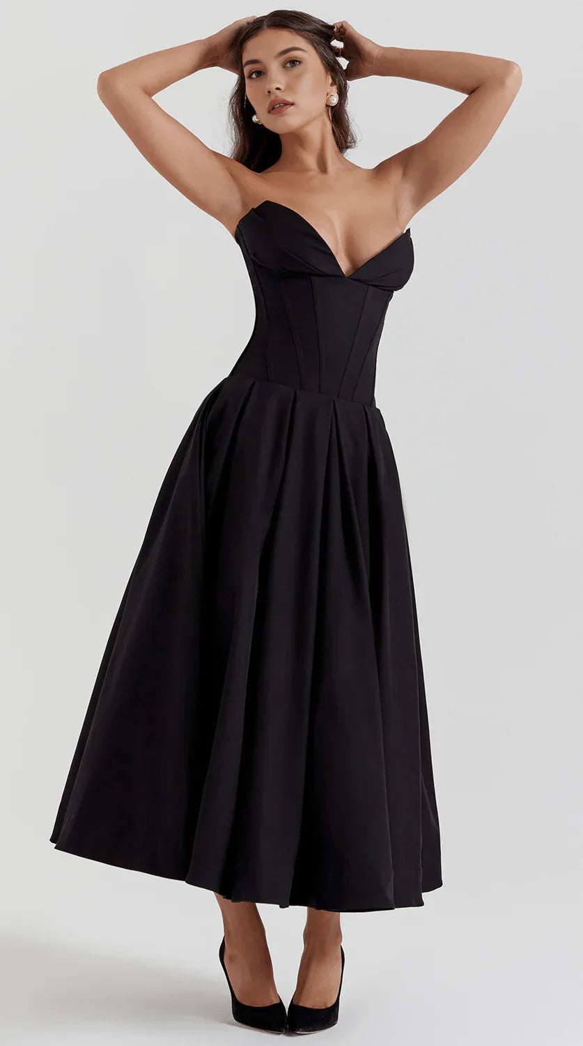 Vestido maxi fluido con detalles artesanales