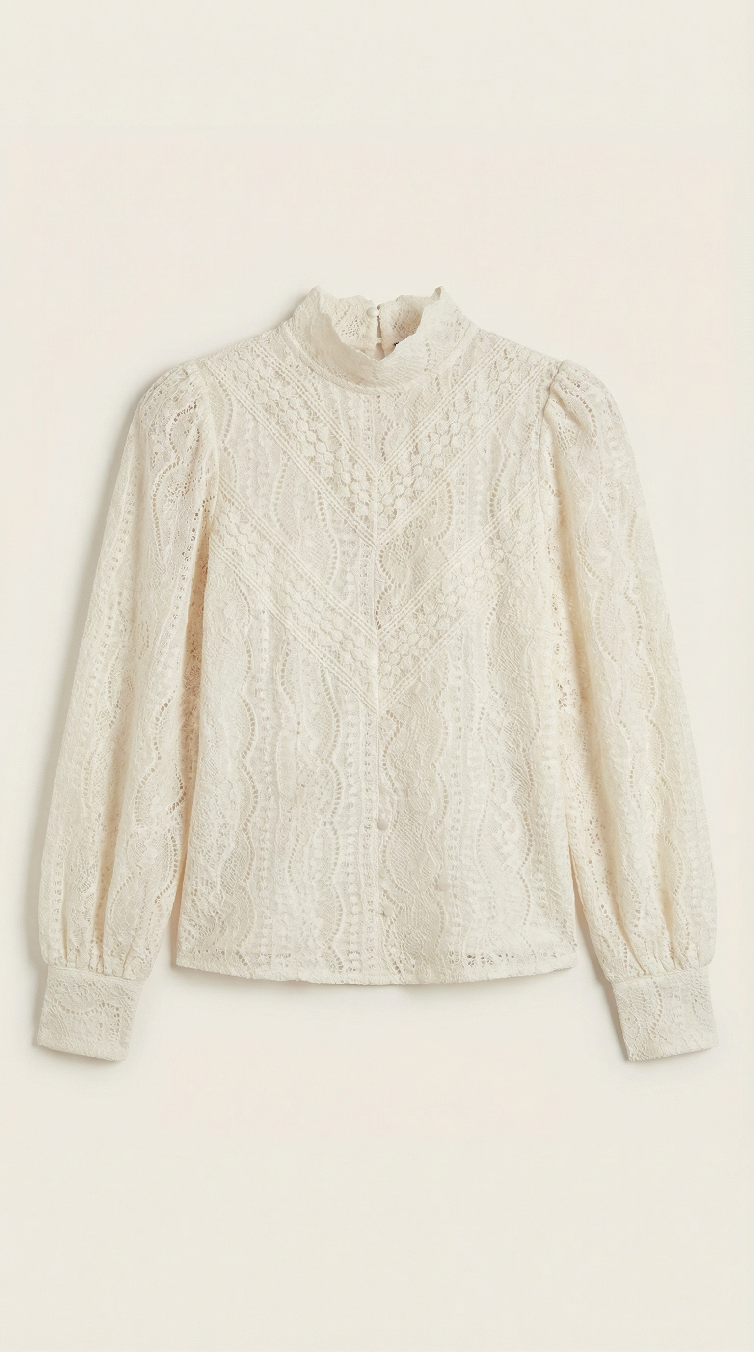 Blusa de manga larga estructurada de líneas elegantes