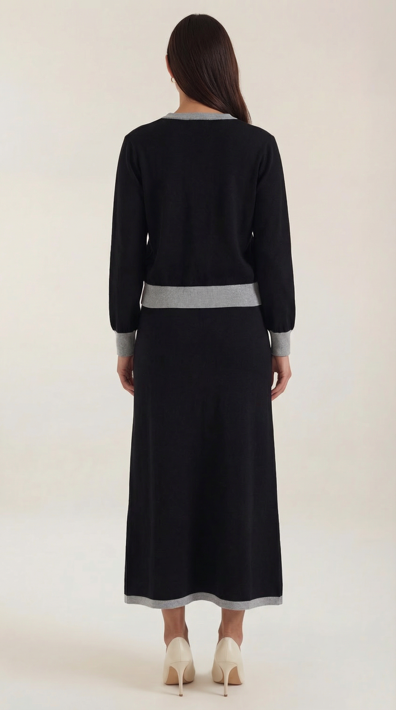 Conjunto de suéter con escote en V y falda midi fluida