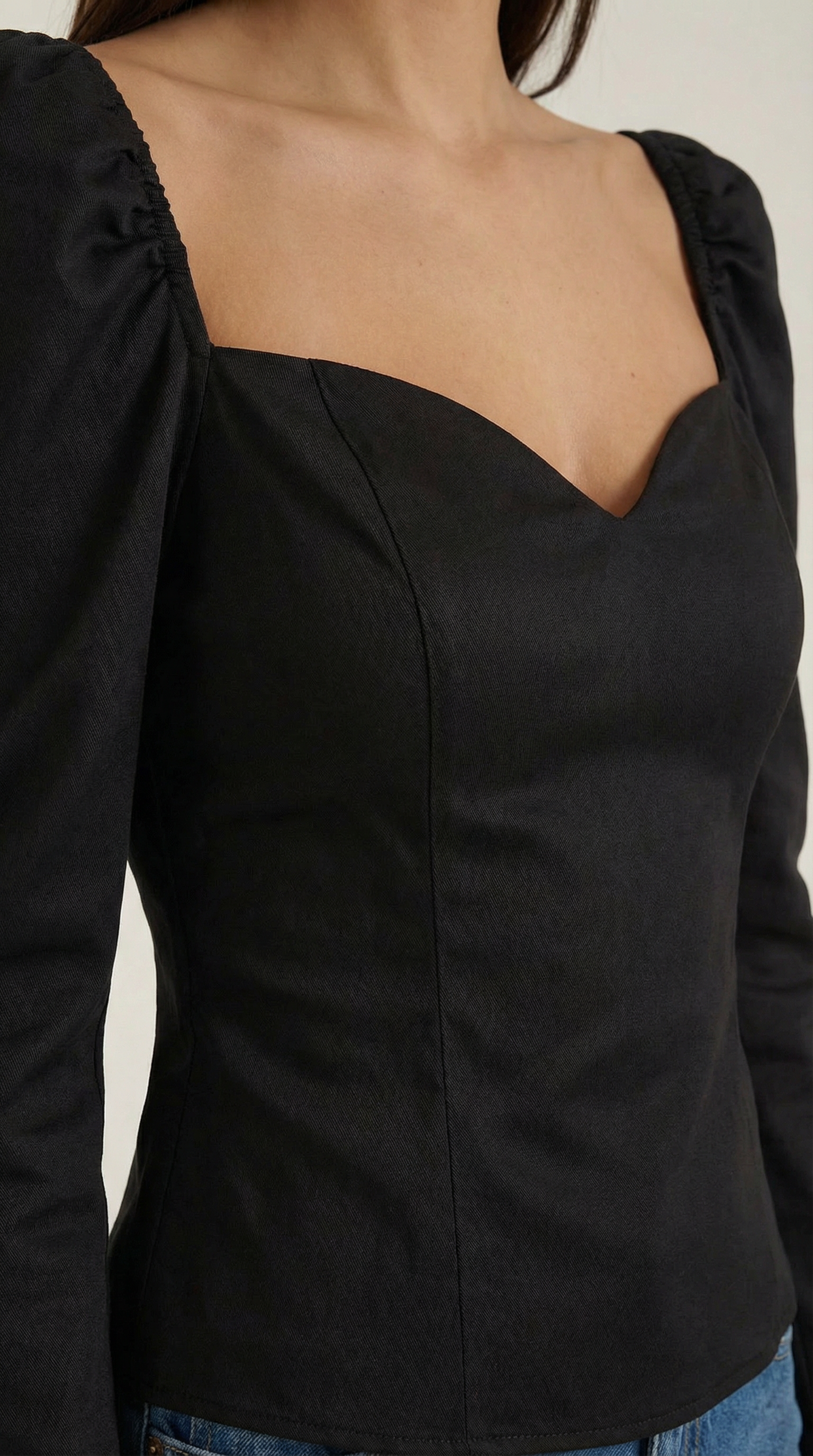 Top con mangas abullonadas y caída fluida