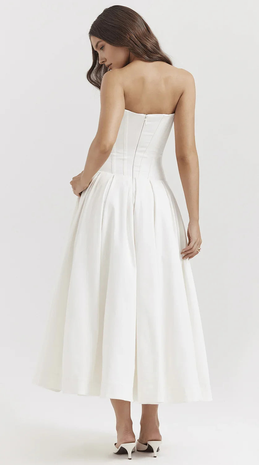 Vestido maxi fluido con detalles artesanales