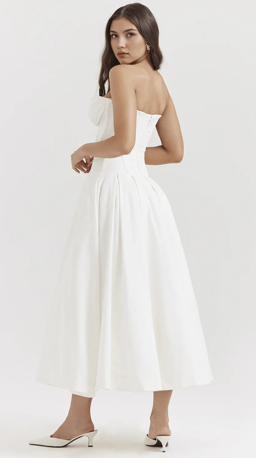 Vestido maxi fluido con detalles artesanales