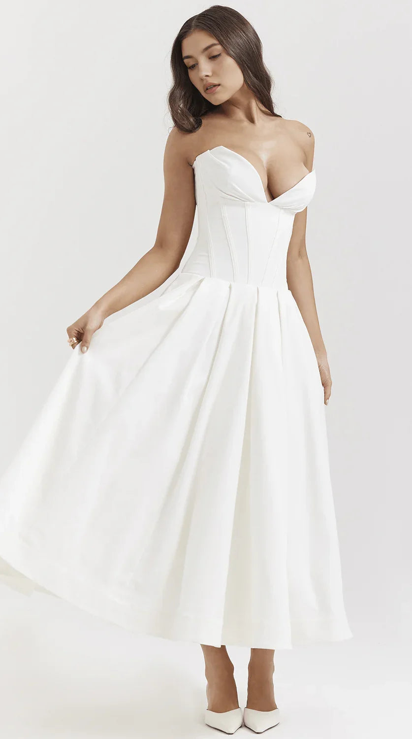 Vestido maxi fluido con detalles artesanales