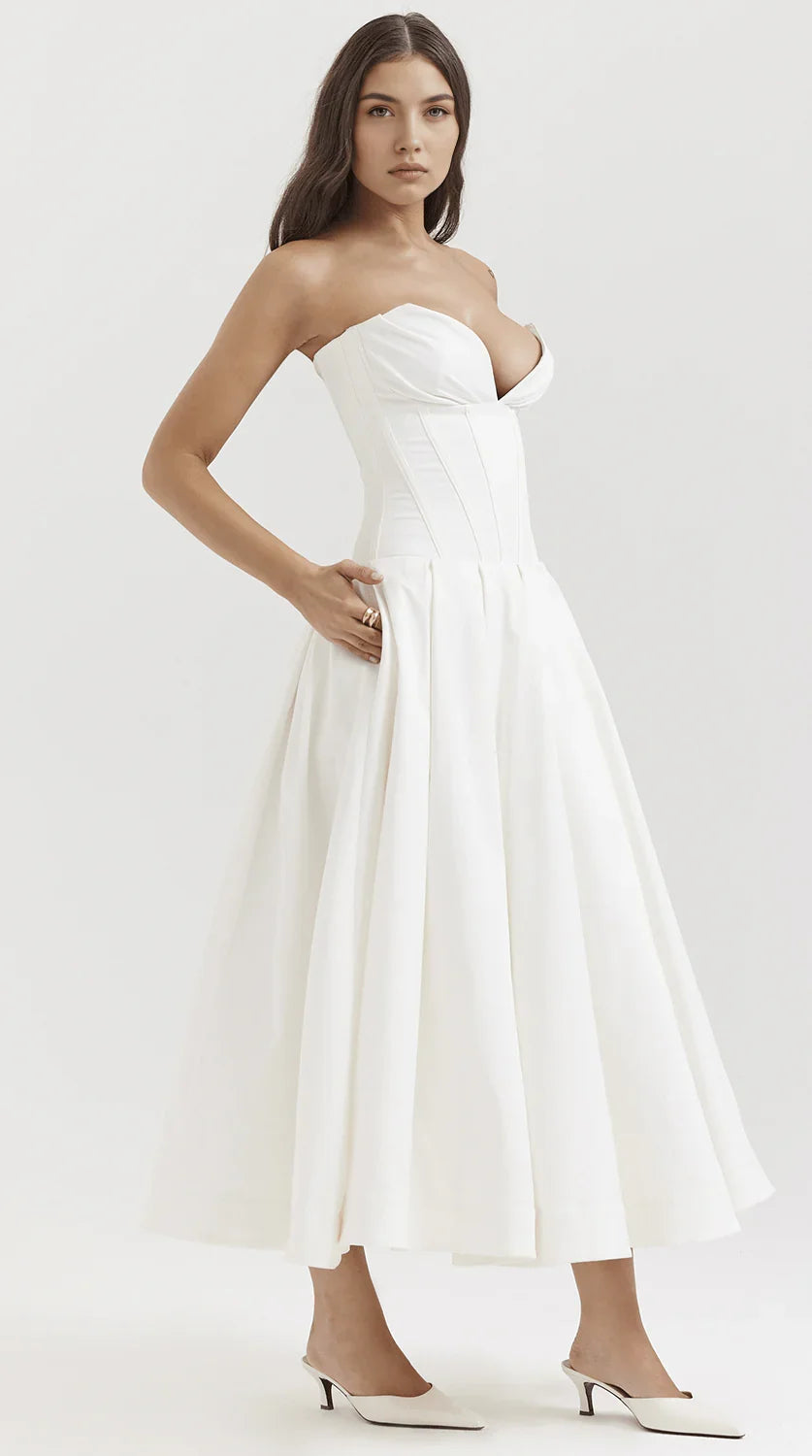 Vestido maxi fluido con detalles artesanales