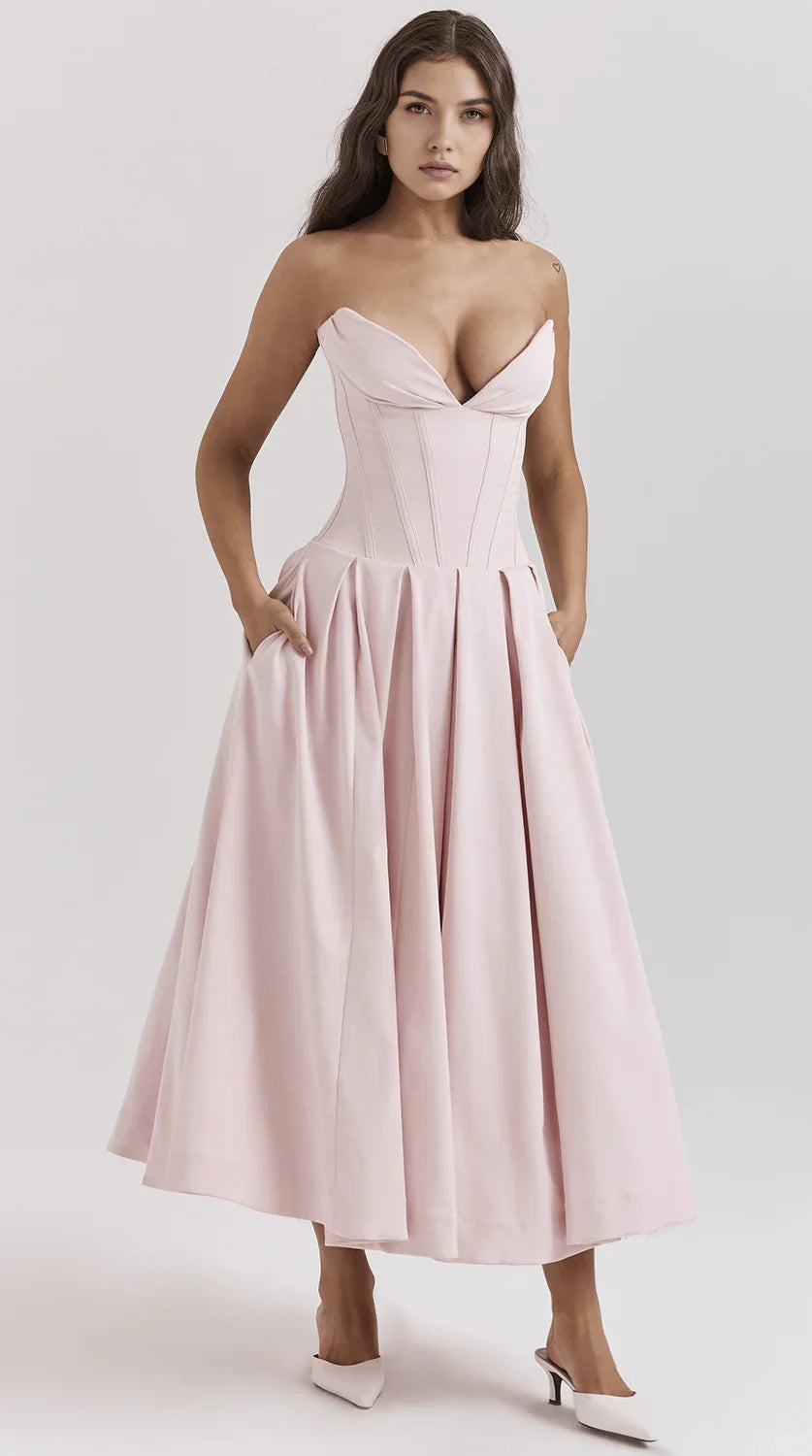 Vestido maxi fluido con detalles artesanales