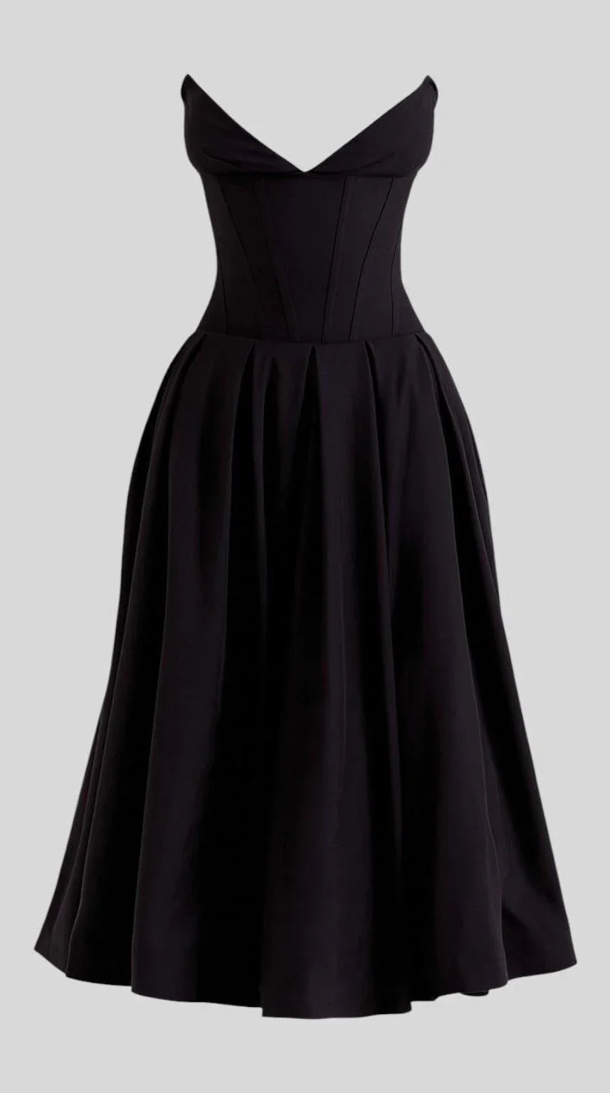 Vestido maxi fluido con detalles artesanales