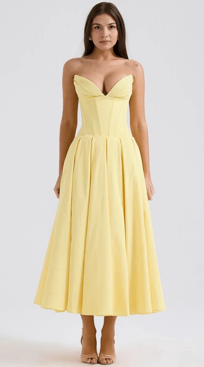 Vestido maxi fluido con detalles artesanales