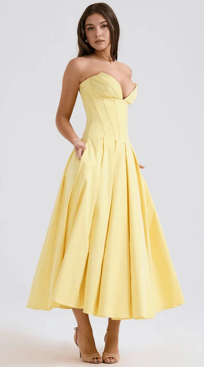 Vestido maxi fluido con detalles artesanales