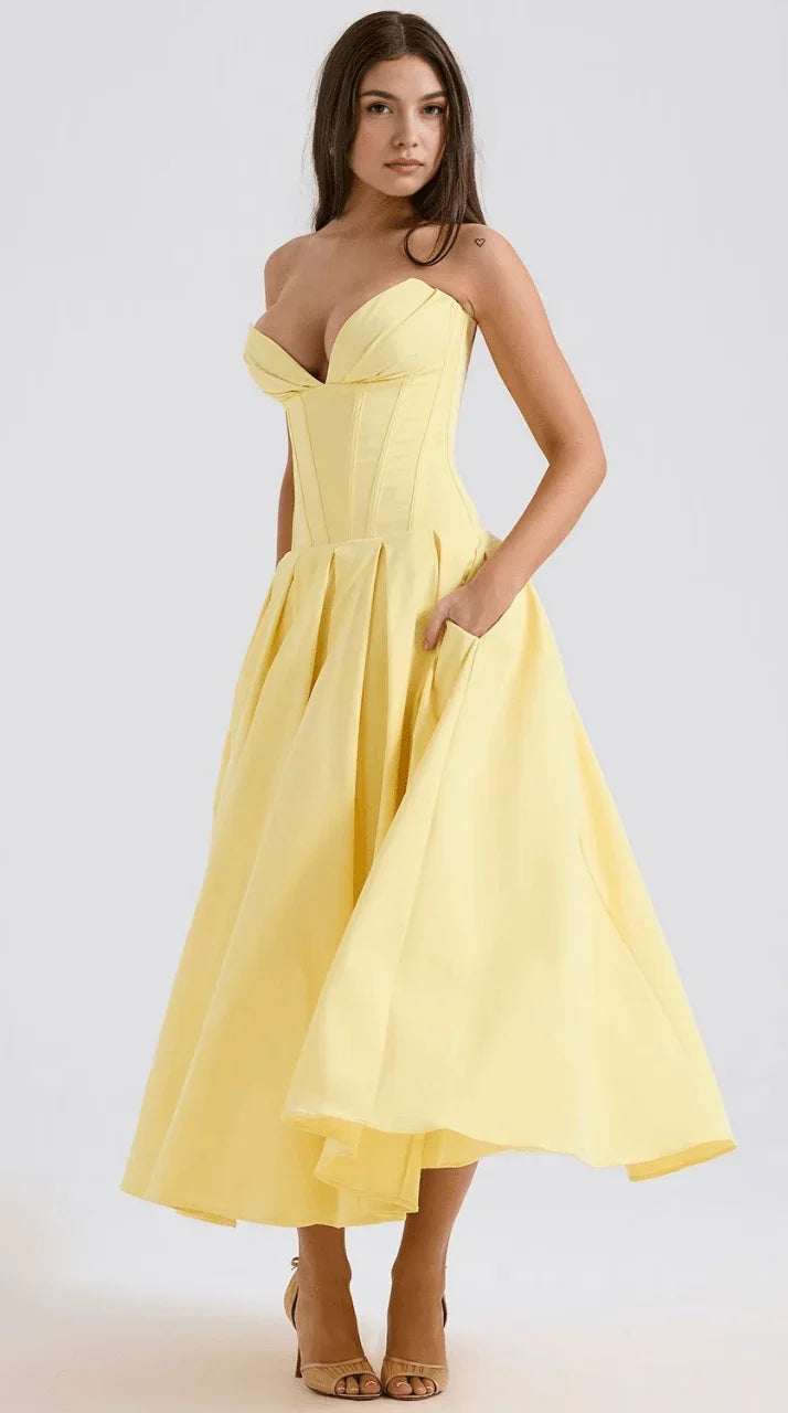 Vestido maxi fluido con detalles artesanales