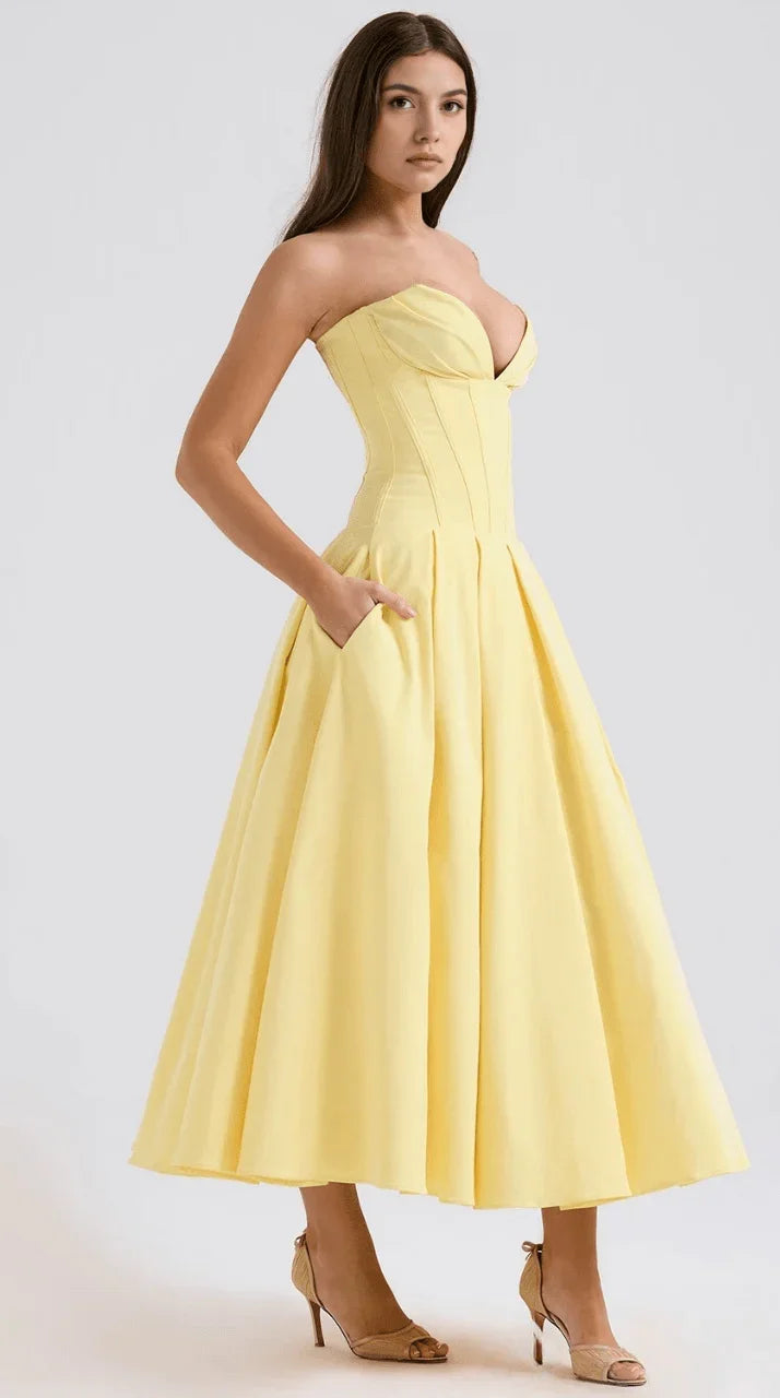 Vestido maxi fluido con detalles artesanales