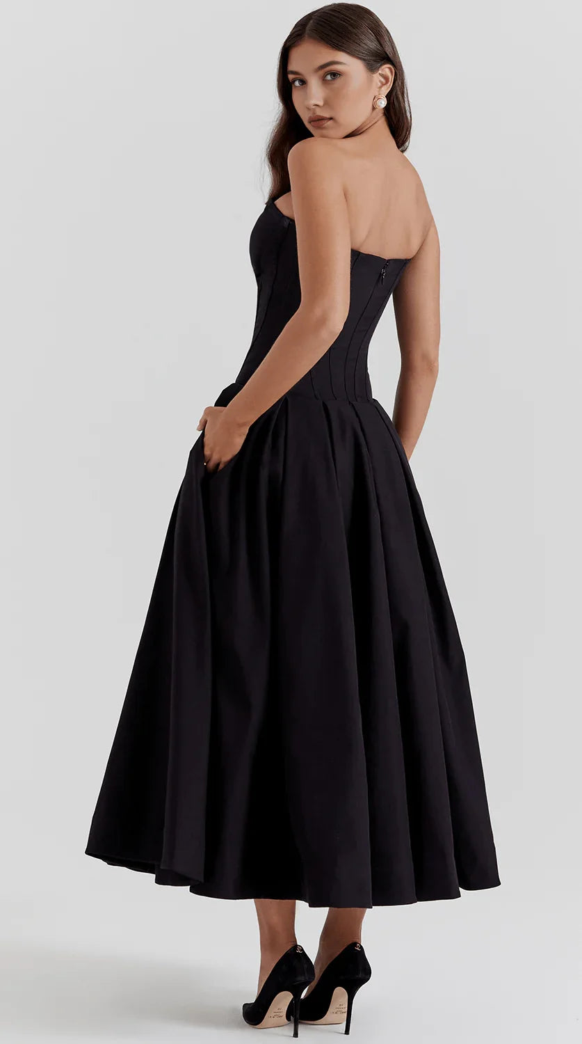 Vestido maxi fluido con detalles artesanales