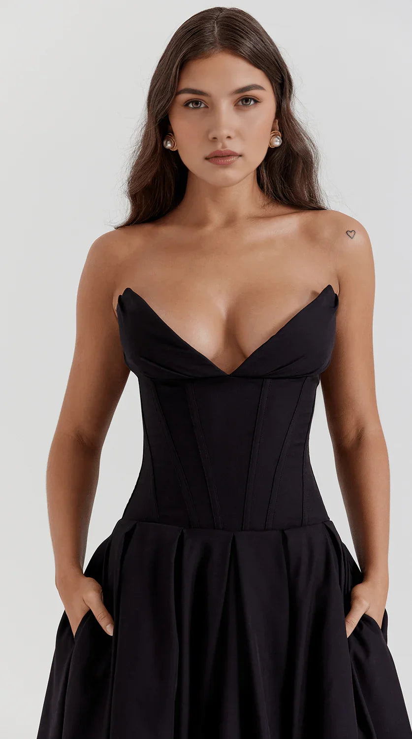 Vestido maxi fluido con detalles artesanales