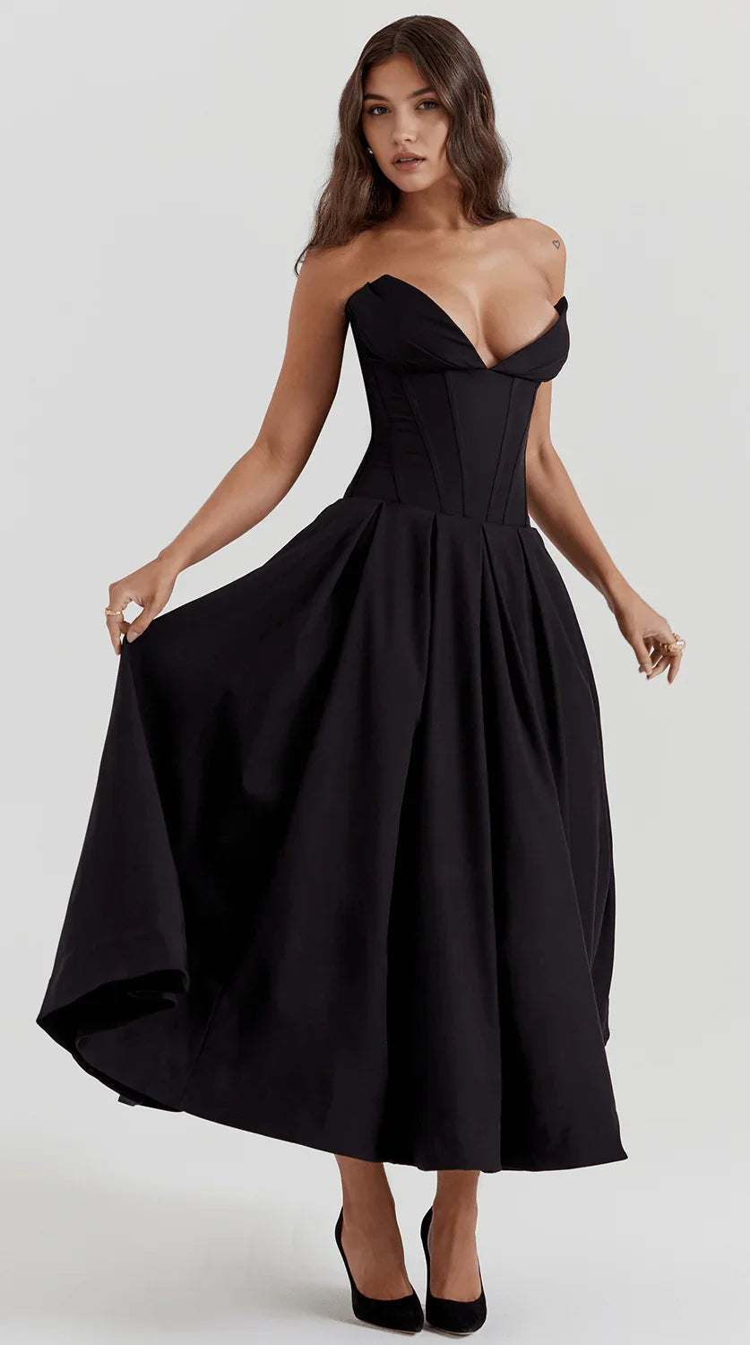 Vestido maxi fluido con detalles artesanales