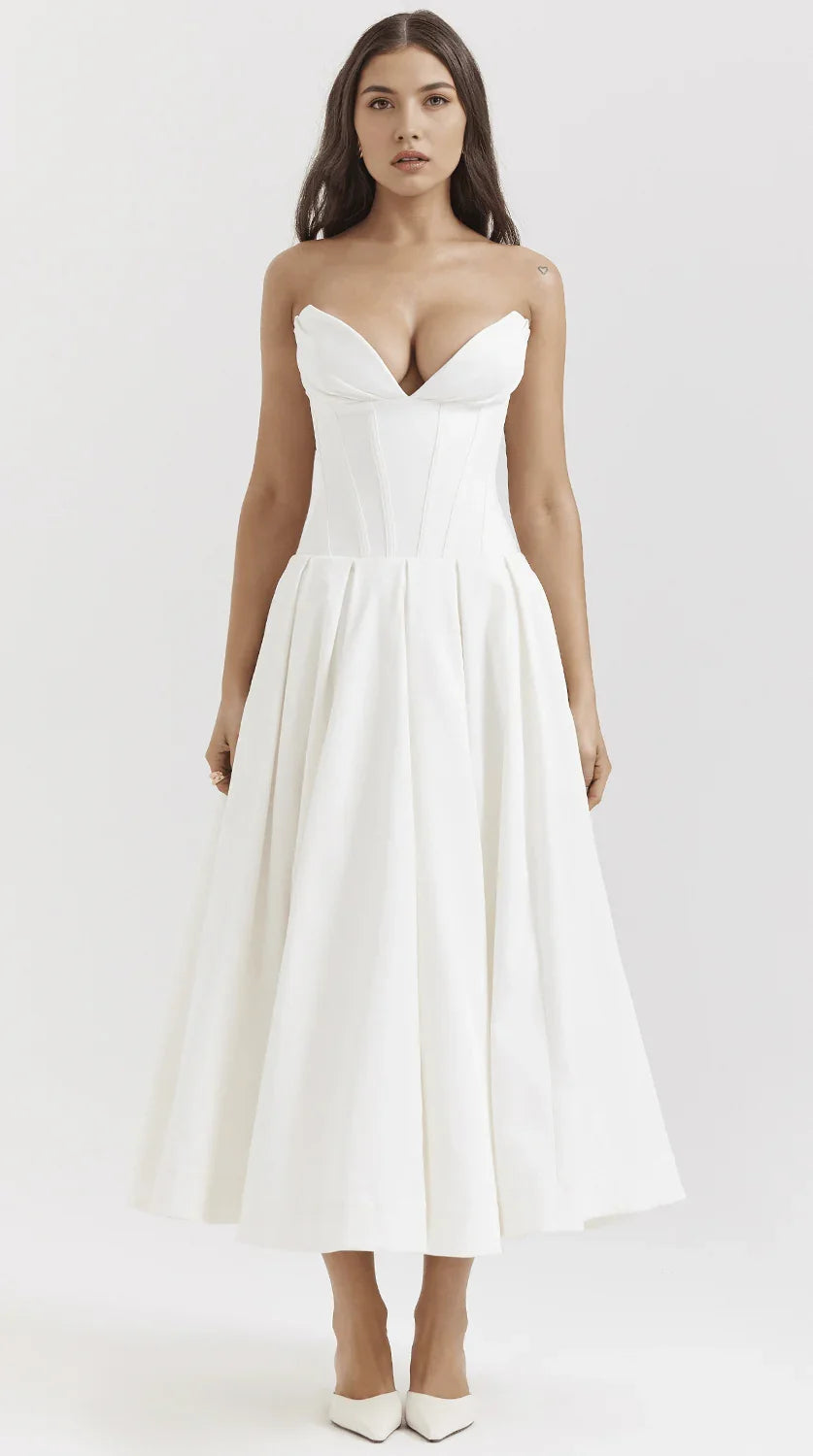 Vestido maxi fluido con detalles artesanales