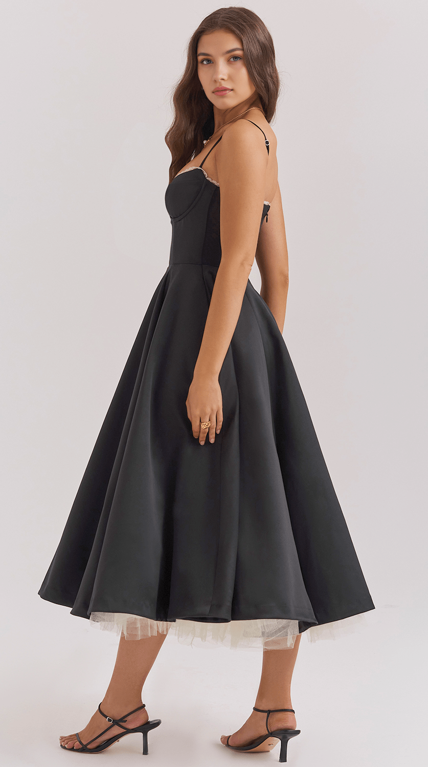 Vestido midi de silueta drapeada